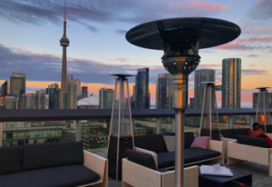evenglo heater in outside patio with the Toronto Skyline