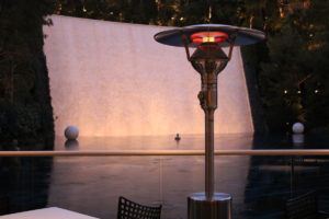 evenglo heater in outside patio by waterfall